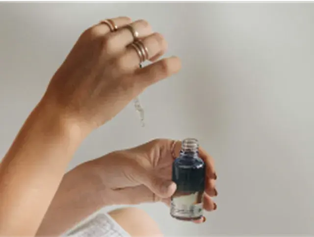 Woman applying cream